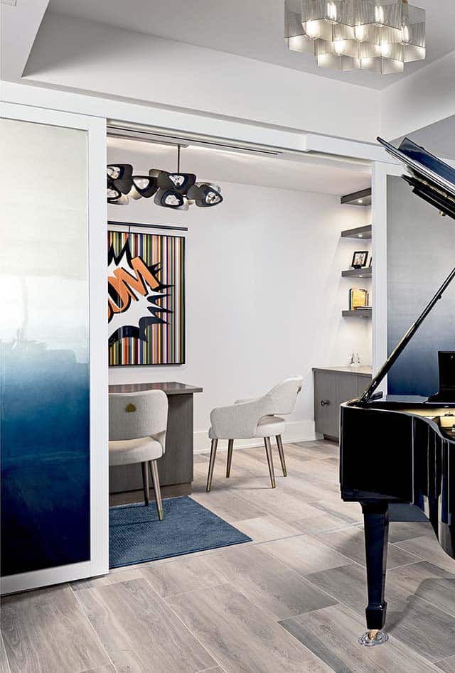 White opaque doors in a living room partially opened showing living space.